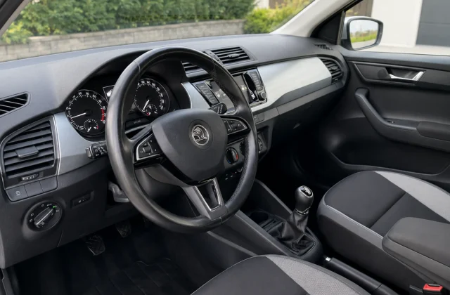 Skoda Fabia interior showing the driver’s dashboard, manual gearbox and air conditioning controls